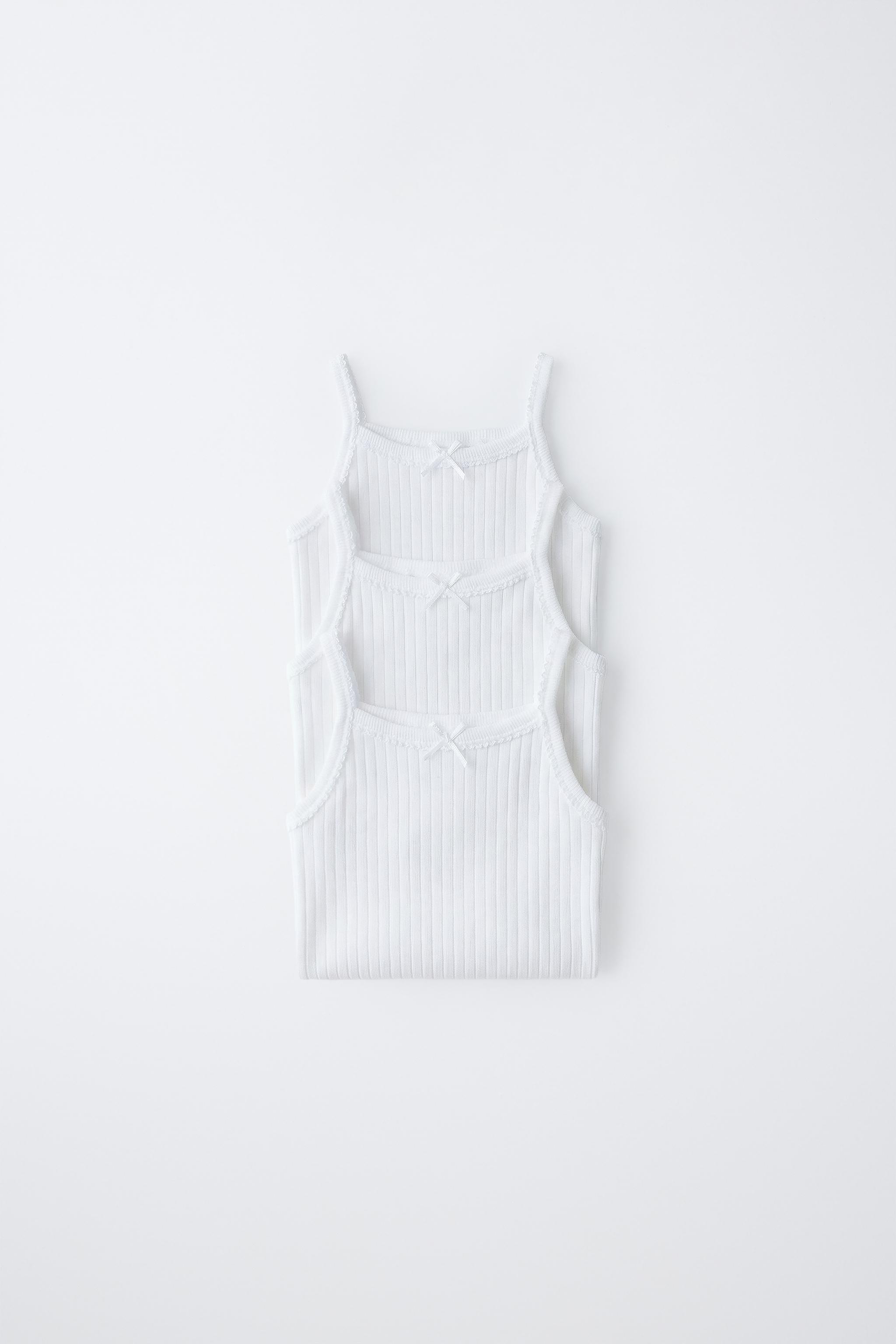 THREE-PACK OF STRAPPY BODYSUITS
